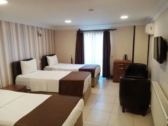 Üç Kişilik Oda