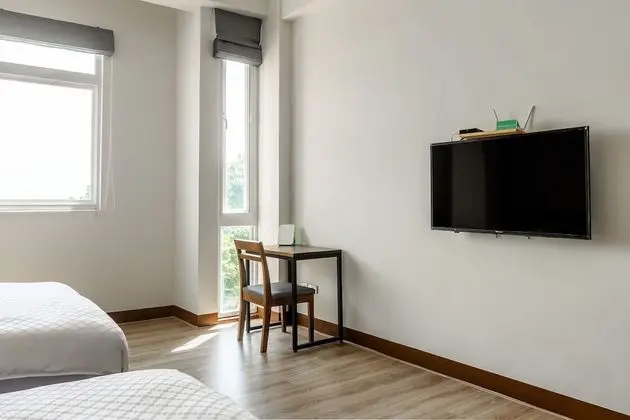 Dört Kişilik Oda, Bahçe Manzaralı