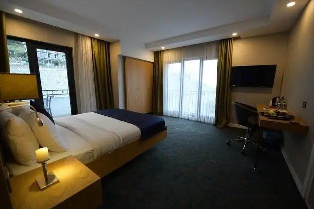 Deluxe Tek Büyük Yataklı Oda, Kısmi Deniz Manzaralı