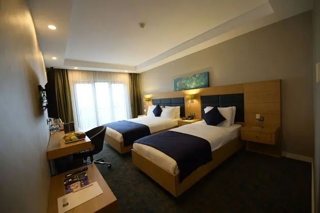 Deluxe Üç Kişilik Oda, 1 Yatak Odası, Kısmi Deniz Manzaralı