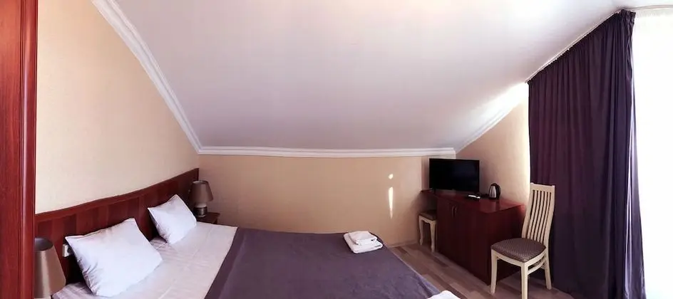 Deluxe Tek Büyük veya İki Ayrı Yataklı Oda