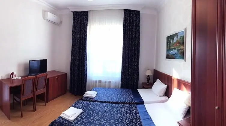 Deluxe Tek Büyük veya İki Ayrı Yataklı Oda