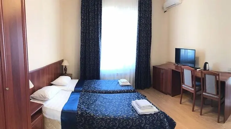 Deluxe Tek Büyük veya İki Ayrı Yataklı Oda