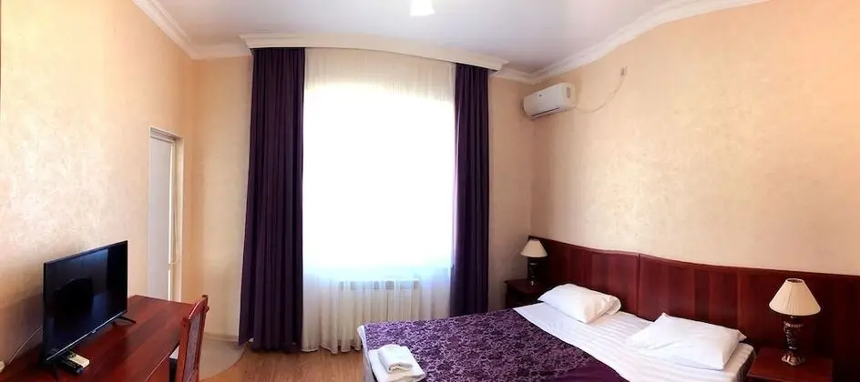 Deluxe Tek Büyük veya İki Ayrı Yataklı Oda, Balkon