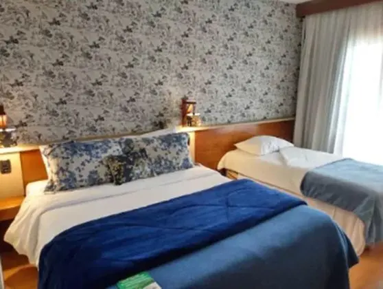 Deluxe Üç Kişilik Oda