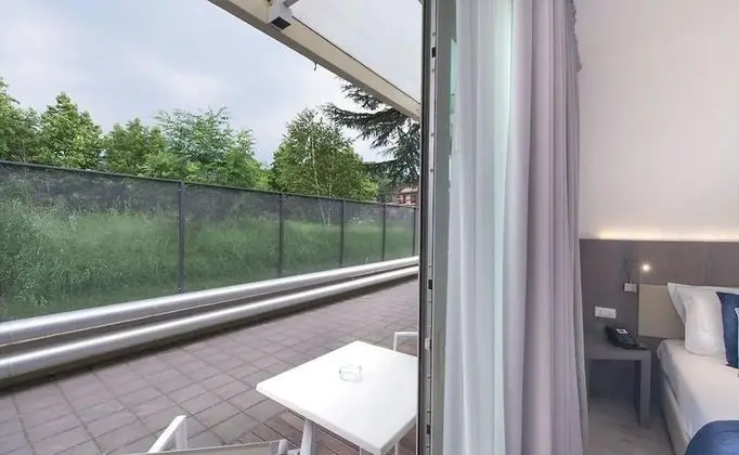 Deluxe Tek Büyük veya İki Ayrı Yataklı Oda