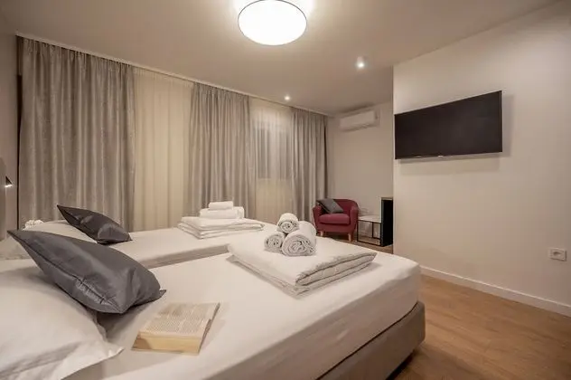 Deluxe Tek Büyük veya İki Ayrı Yataklı Oda (1)