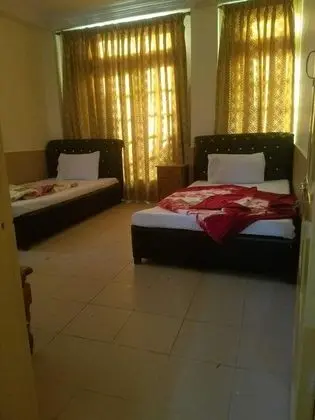 Deluxe Tek Büyük veya İki Ayrı Yataklı Oda
