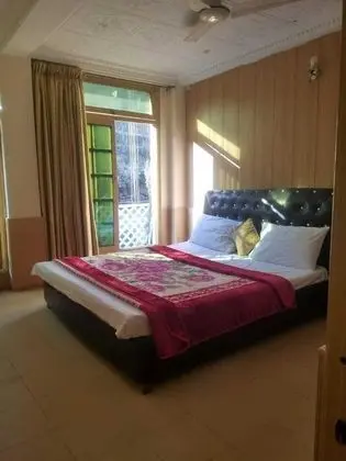 Deluxe Tek Büyük veya İki Ayrı Yataklı Oda