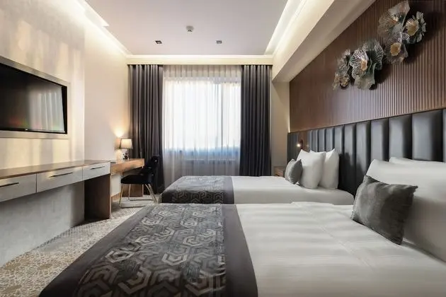 City Tek Büyük veya İki Ayrı Yataklı Oda