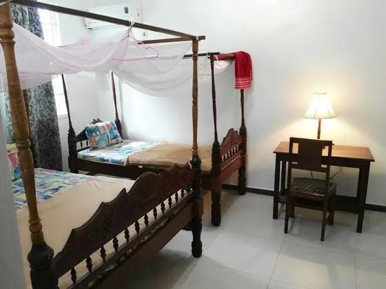 Economy Üç Kişilik Oda, Ortak Banyo