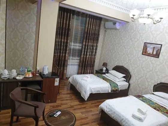 Deluxe Üç Kişilik Oda