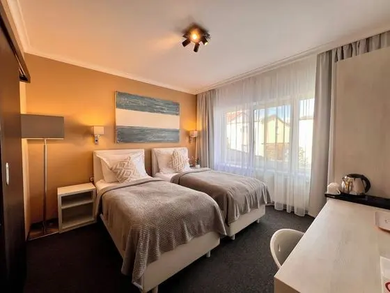 Comfort Tek Büyük veya İki Ayrı Yataklı Oda