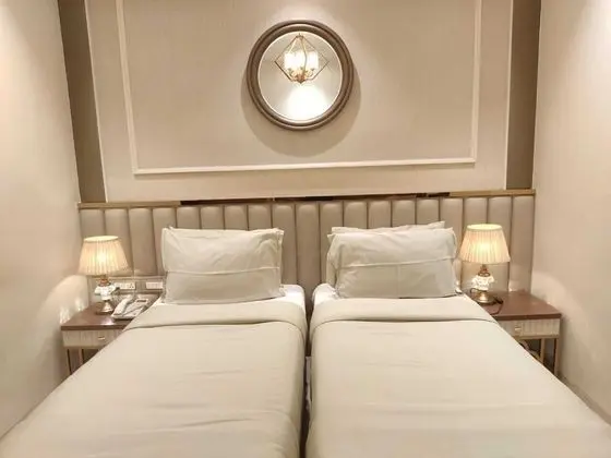 Deluxe Tek Büyük veya İki Ayrı Yataklı Oda