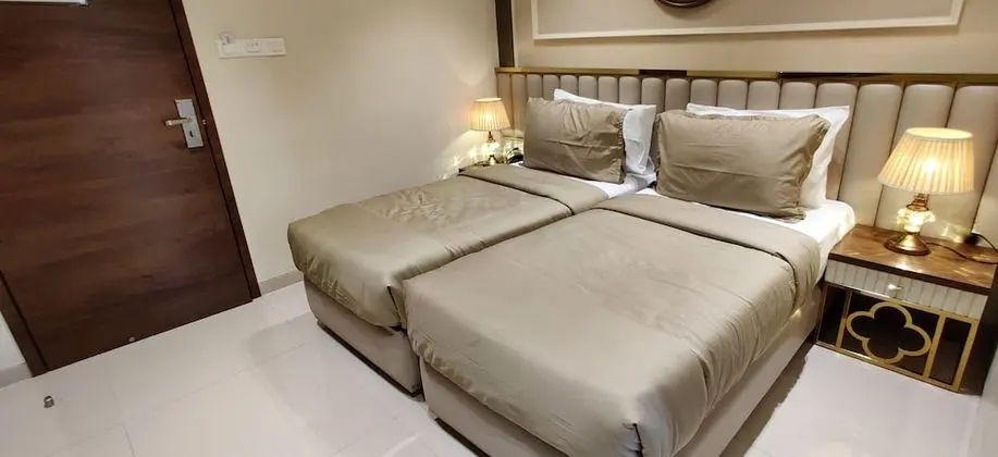 Deluxe Tek Büyük veya İki Ayrı Yataklı Oda