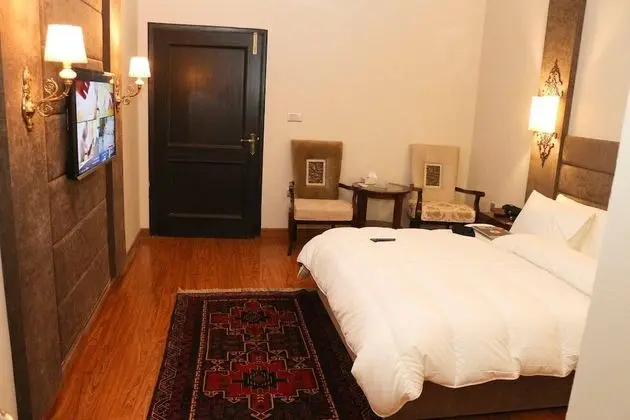 Deluxe Tek Büyük veya İki Ayrı Yataklı Oda