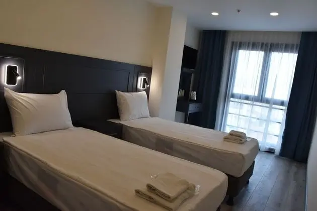 Comfort Tek Büyük veya İki Ayrı Yataklı Oda
