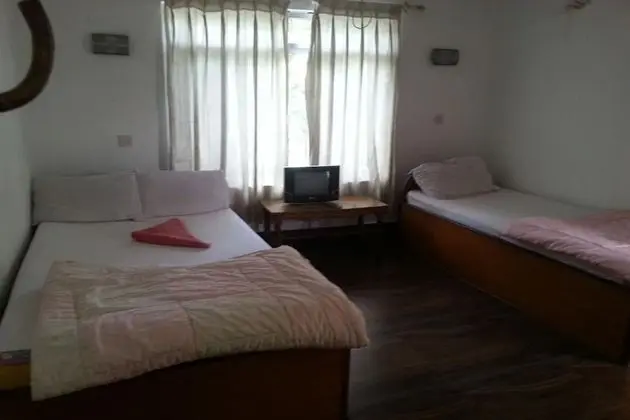 Üç Kişilik Oda