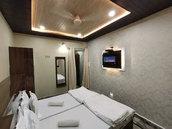 Deluxe Tek Büyük veya İki Ayrı Yataklı Oda