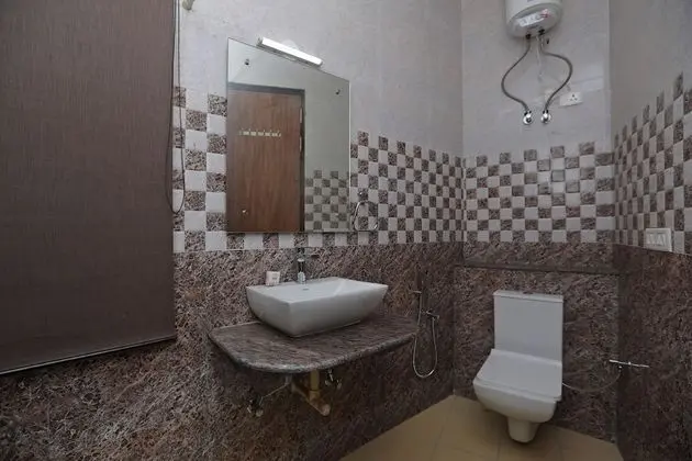 Deluxe Tek Büyük veya İki Ayrı Yataklı Oda
