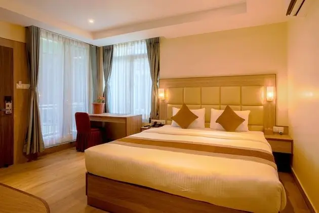 Deluxe Tek Büyük veya İki Ayrı Yataklı Oda