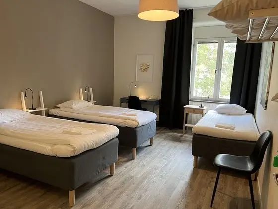 Basic Üç Kişilik Oda, Ortak Banyo