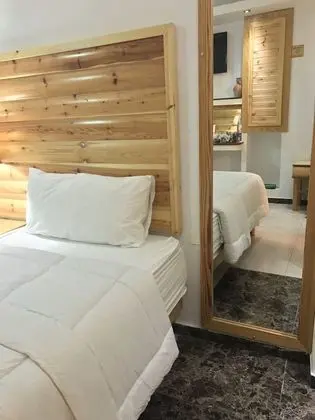 Üç Kişilik Oda