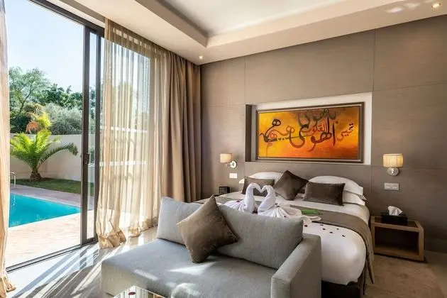 Suite Deluxe avec piscine privée chauffée et jardin privé