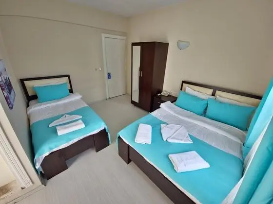 Üç Kişilik Oda, Bahçe Manzaralı