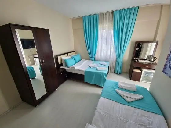 Üç Kişilik Oda, Bahçe Manzaralı