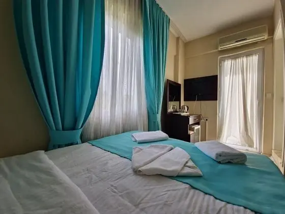 Üç Kişilik Oda, Bahçe Manzaralı