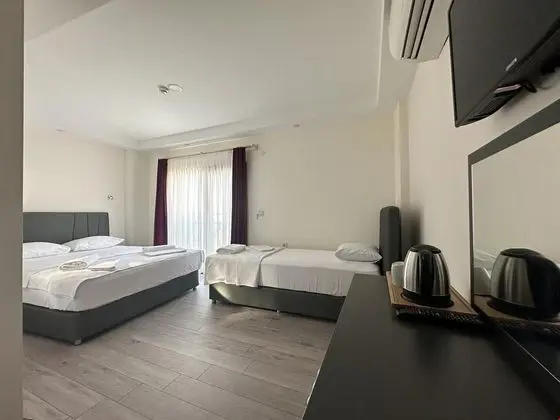 Üç Kişilik Oda