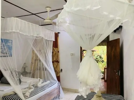 Deluxe Üç Kişilik Oda, 1 Yatak Odası, Bahçe Manzaralı
