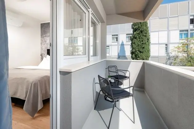 Deluxe Tek Büyük veya İki Ayrı Yataklı Oda, Balkon, Şehir Manzaralı