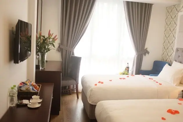 Deluxe Tek Büyük veya İki Ayrı Yataklı Oda