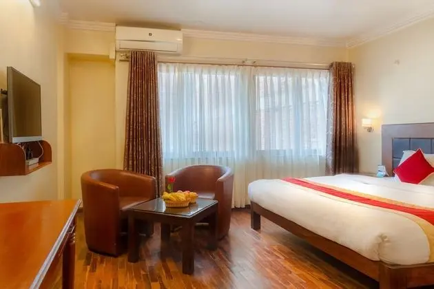 Deluxe Tek Büyük veya İki Ayrı Yataklı Oda