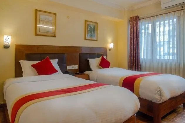 Deluxe Tek Büyük veya İki Ayrı Yataklı Oda