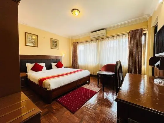 Deluxe Tek Büyük veya İki Ayrı Yataklı Oda