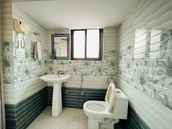 Deluxe Tek Büyük veya İki Ayrı Yataklı Oda