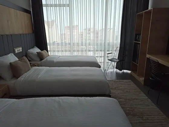Deluxe Üç Kişilik Oda