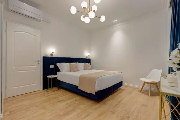 Deluxe Tek Büyük veya İki Ayrı Yataklı Oda