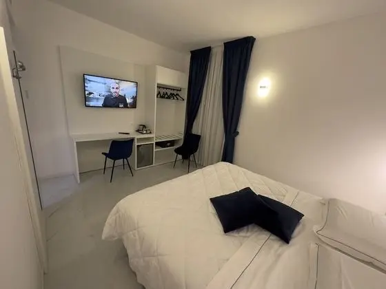 Deluxe Tek Büyük veya İki Ayrı Yataklı Oda