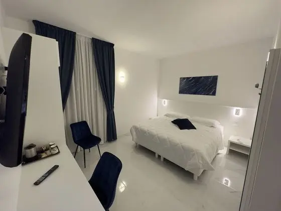 Deluxe Tek Büyük veya İki Ayrı Yataklı Oda