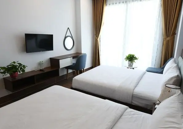Deluxe Tek Büyük veya İki Ayrı Yataklı Oda
