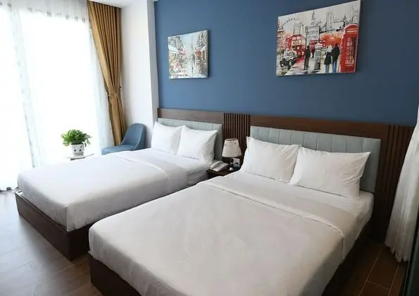 Deluxe Tek Büyük veya İki Ayrı Yataklı Oda