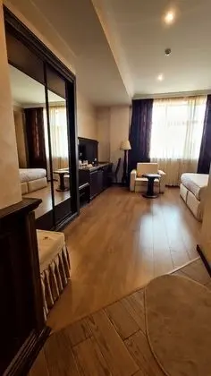 Deluxe Tek Büyük veya İki Ayrı Yataklı Oda