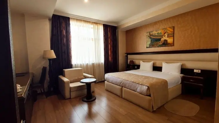 Deluxe Tek Büyük veya İki Ayrı Yataklı Oda
