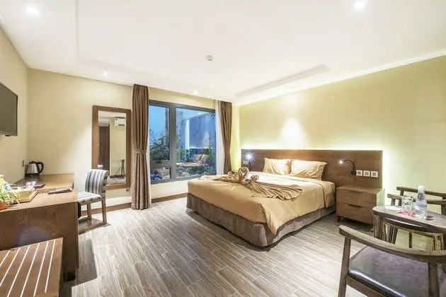 Deluxe Tek Büyük veya İki Ayrı Yataklı Oda