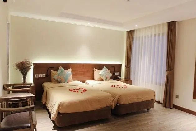 Deluxe Tek Büyük veya İki Ayrı Yataklı Oda
