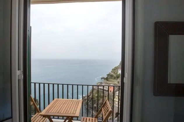 Deluxe Tek Büyük Yataklı Oda, Deniz Manzaralı (Sol)